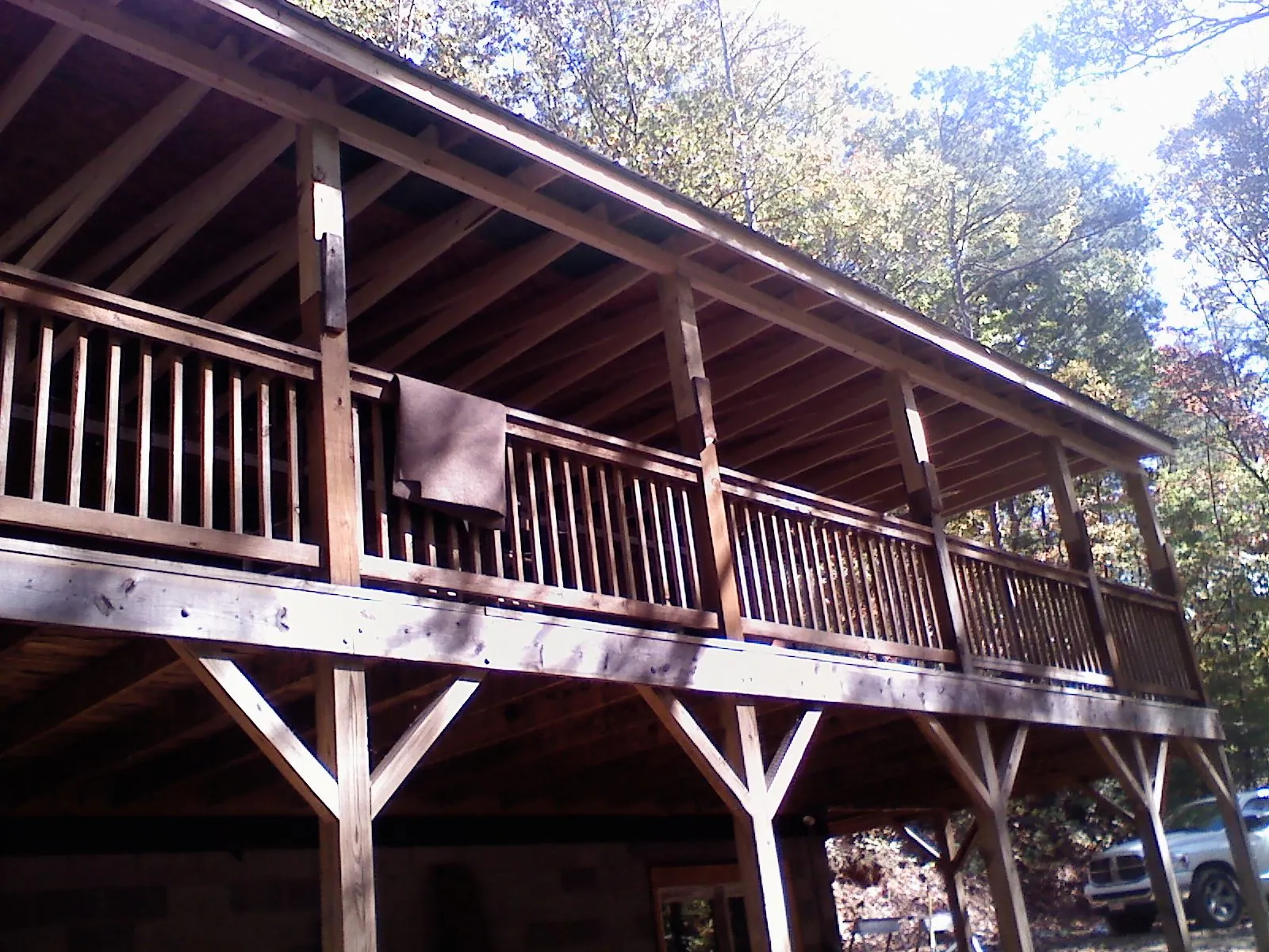 Timber framing under a new elevated porch and deck — Roof Leak Repair in Bay Saint Louis by Roofing Brothers